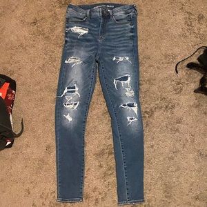 Ripped American eagle jeans with patches